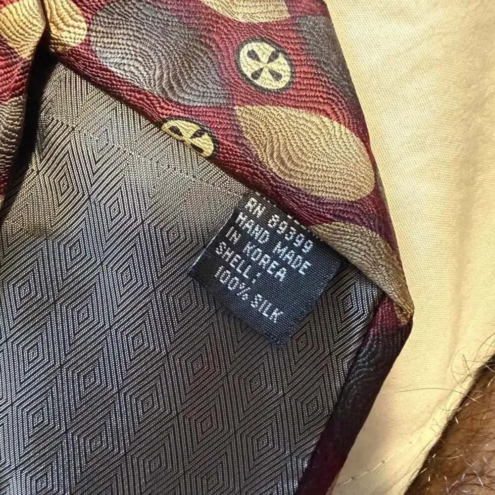 Versini Silk Tie Burgundy Brown Skull Geometric Pattern